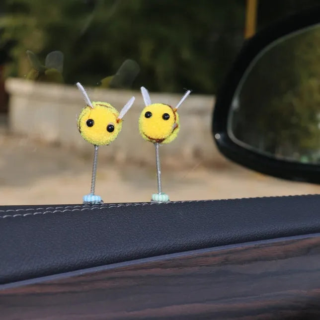 Swing Spring Bee car decoration with fur ball material and cartoon design measuring 3x3 cm