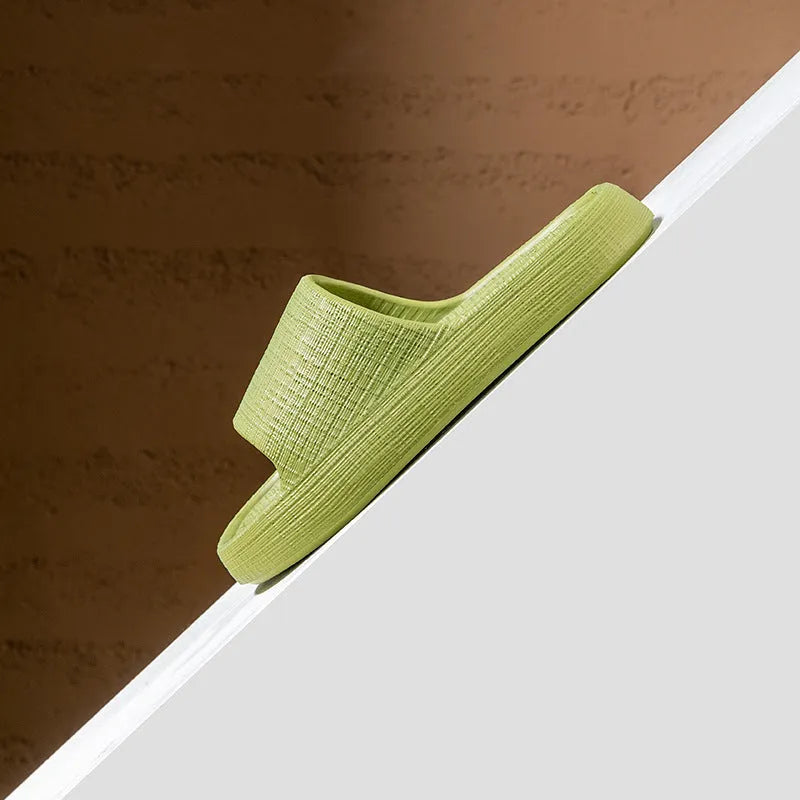Women's non-slip EVA flip flop slippers in five colours, showing toe ring design and textured sole.