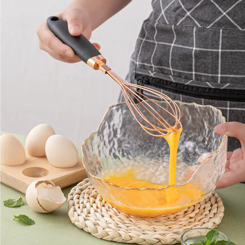 Seven-piece kitchen utensil set with stainless steel blades and copper-plated handles in multiple colour options