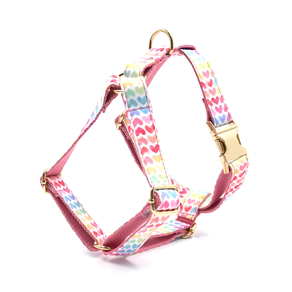Pink colourful heart stone dog harness with gold buckle on a polyester chest and back strap.