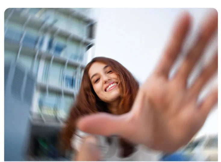 Grey hand-held three-axis anti-shake stabiliser with AI face tracking and fill light for short video shooting