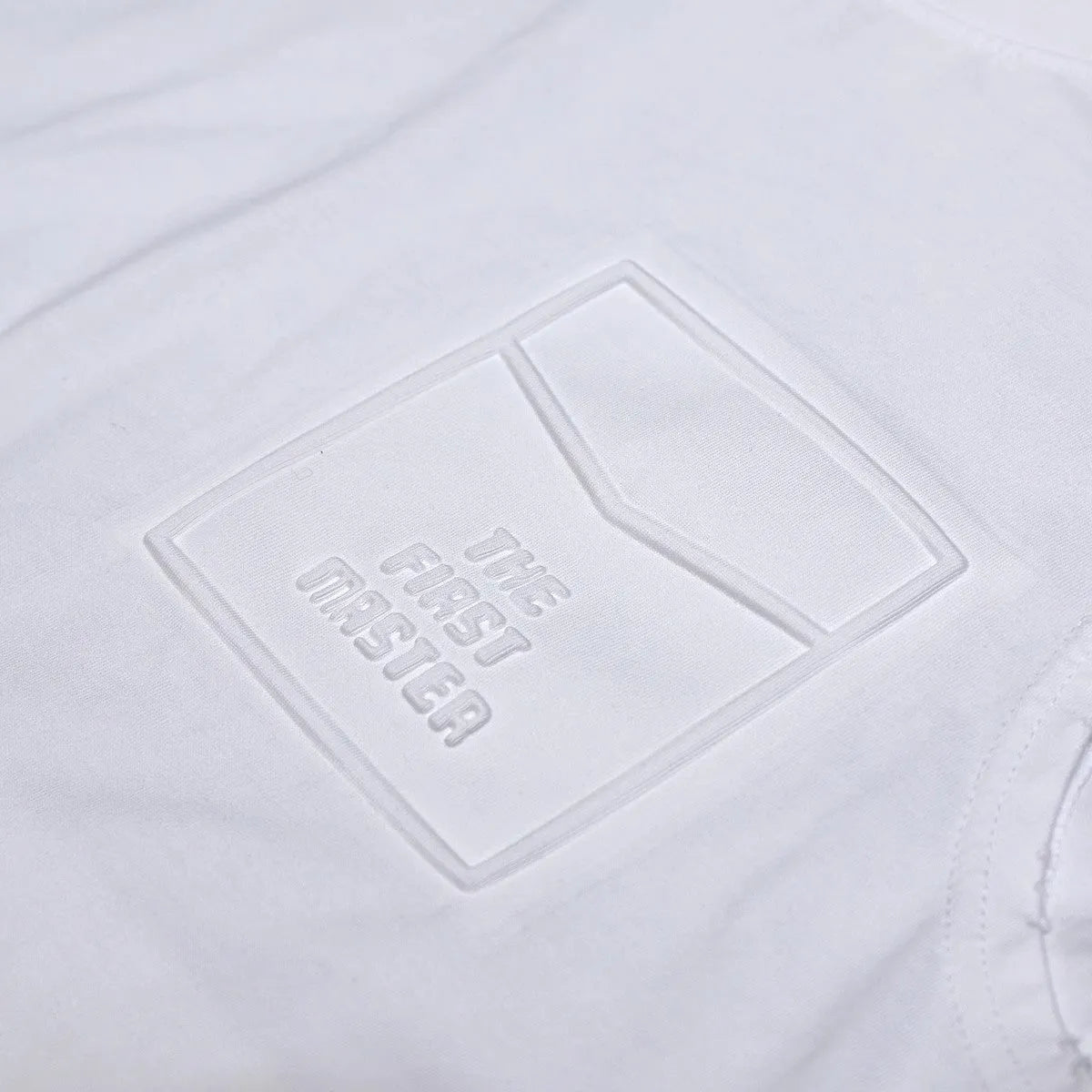 Men's solid colour loose fit cotton sleeveless t-shirt on hanger, black and white options.