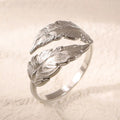 Women's adjustable feather design ring in gold and silver titanium steel options