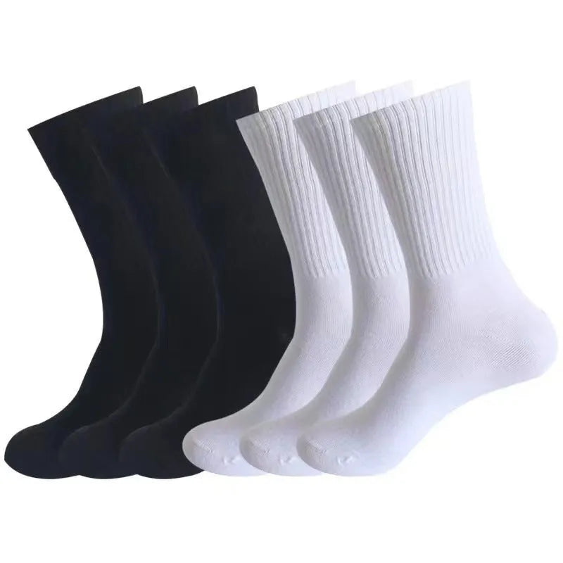 Mid-calf sports buffer socks in black, white, and grey colours with sweat absorption properties