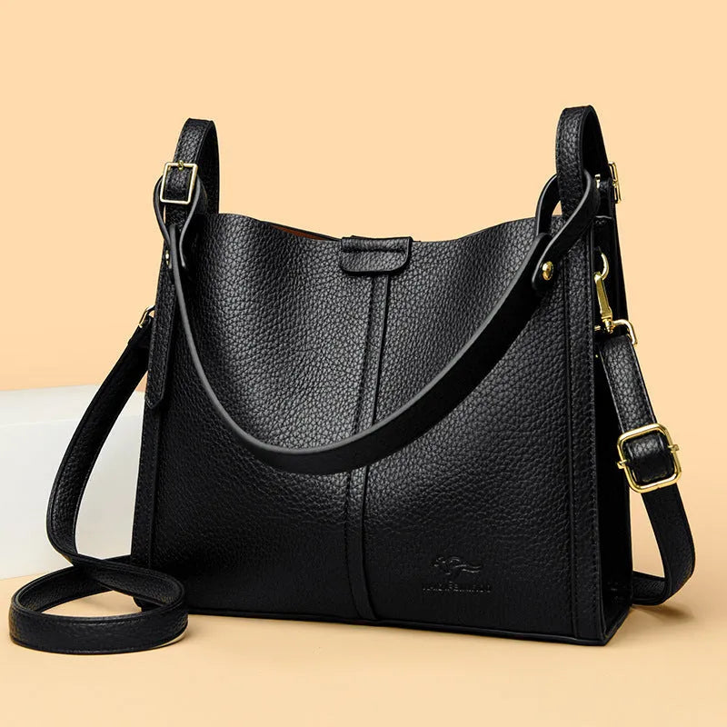 Vertical square ladies shoulder bag in soft PU with internal organisation compartments