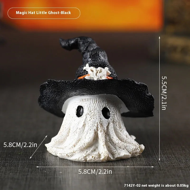 Resin wizard hat holiday ornament in purple and black colour options.