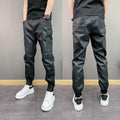 Black waterproof windproof casual rider motorcycle tapered pants with artificial leather lining and mid-rise waist