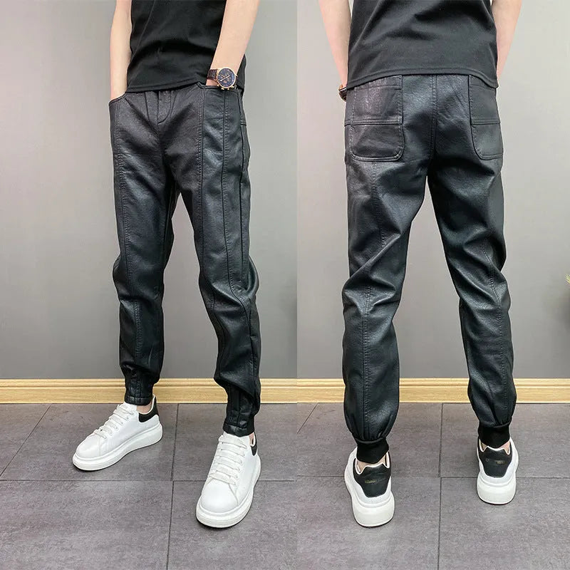 Black waterproof windproof casual rider motorcycle tapered pants with artificial leather lining and mid-rise waist