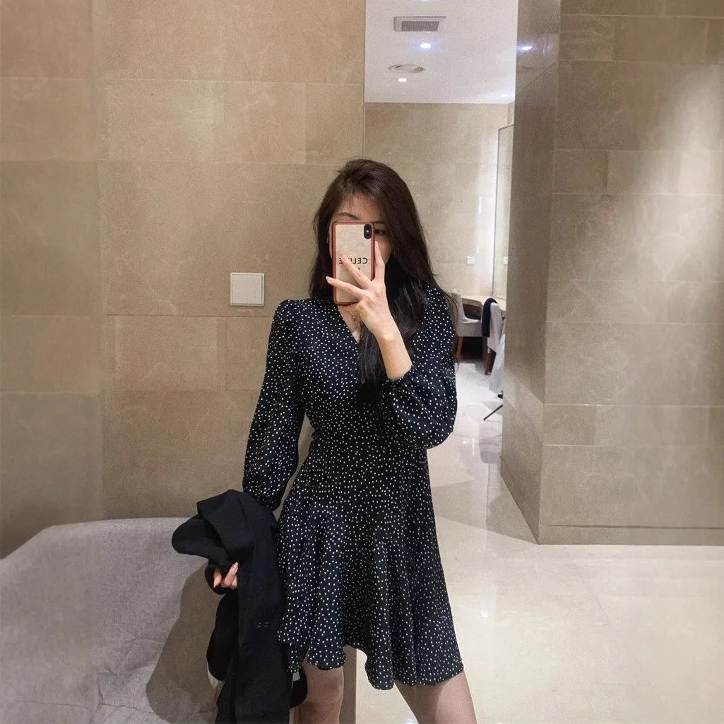 Women's black polka dot high waist midi dress with long sleeves in polyester fabric