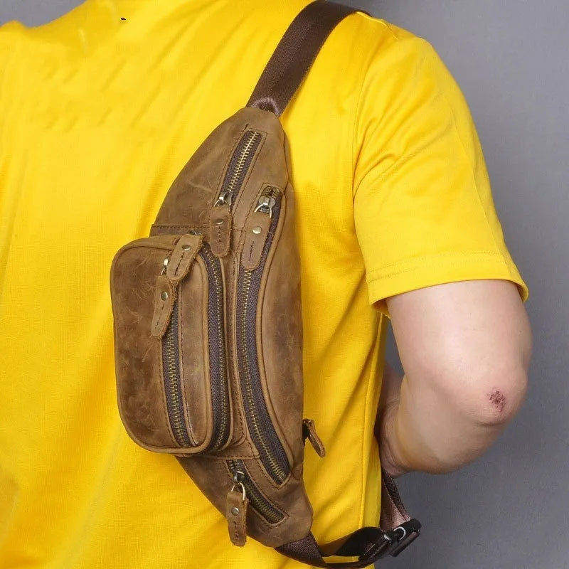 Brown leather retro shoulder messenger bag with single strap showing 32cm width dimensions