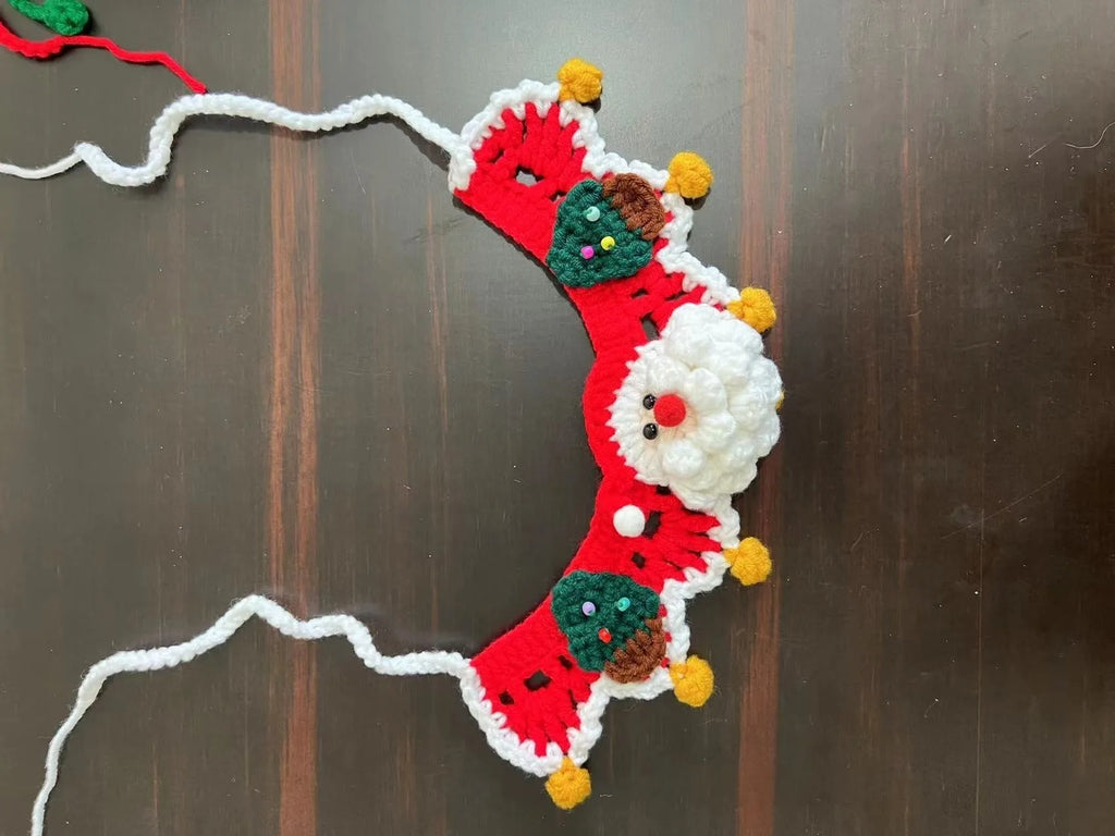 Knitted wool Christmas pet scarf with Santa Claus pattern for dogs and cats in holiday red and green colours