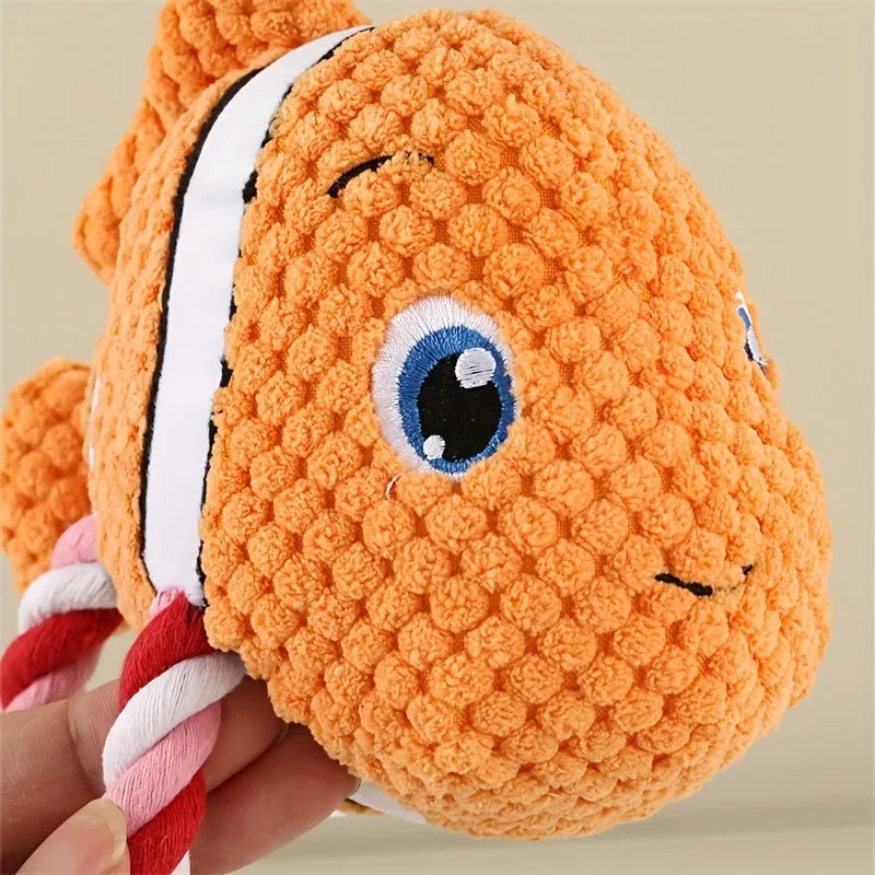Turtle shaped dog chewing toy with knotted rope sections and plush fabric in grey colour