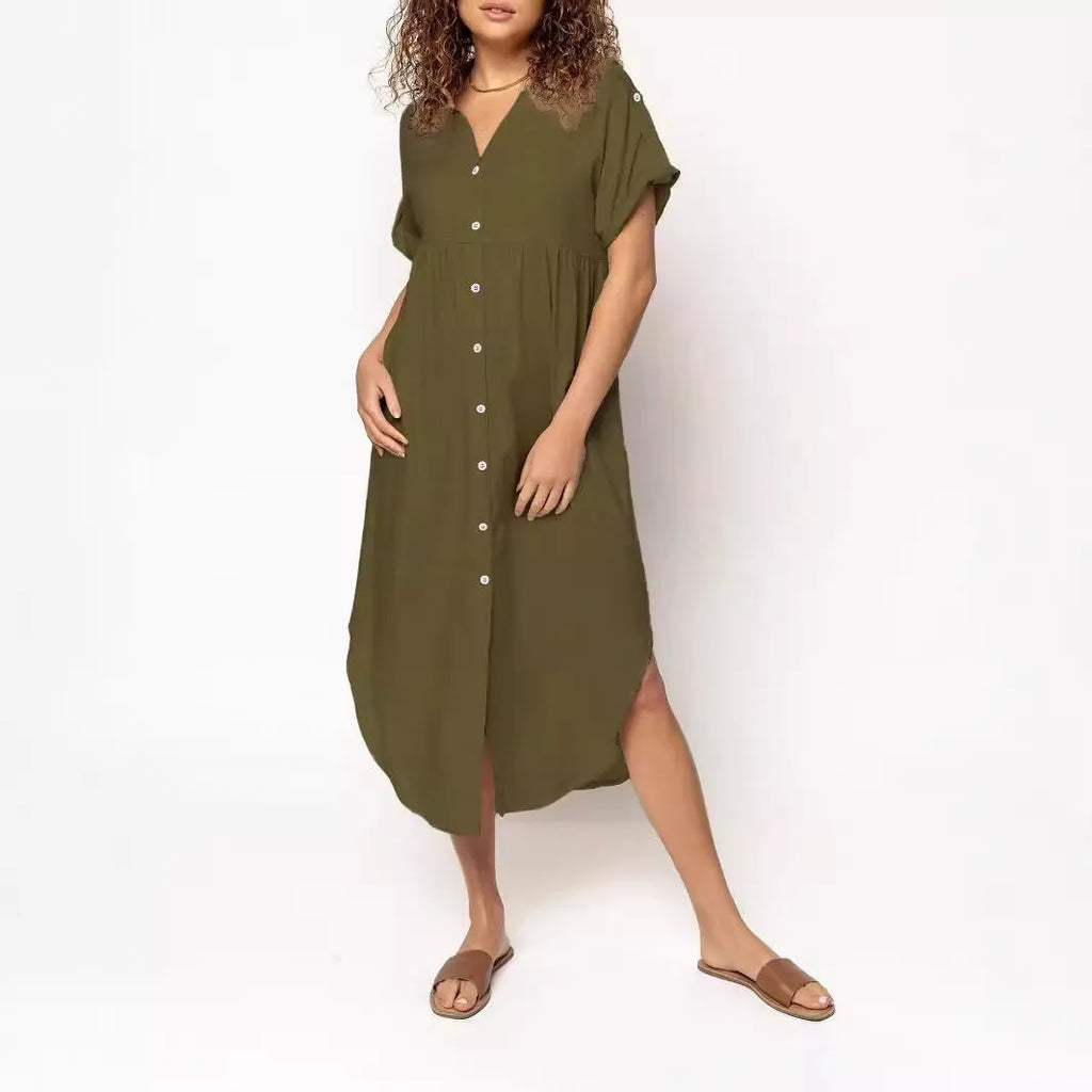 Loose-fitting mid-length casual dress with button front detail on a hanger.
