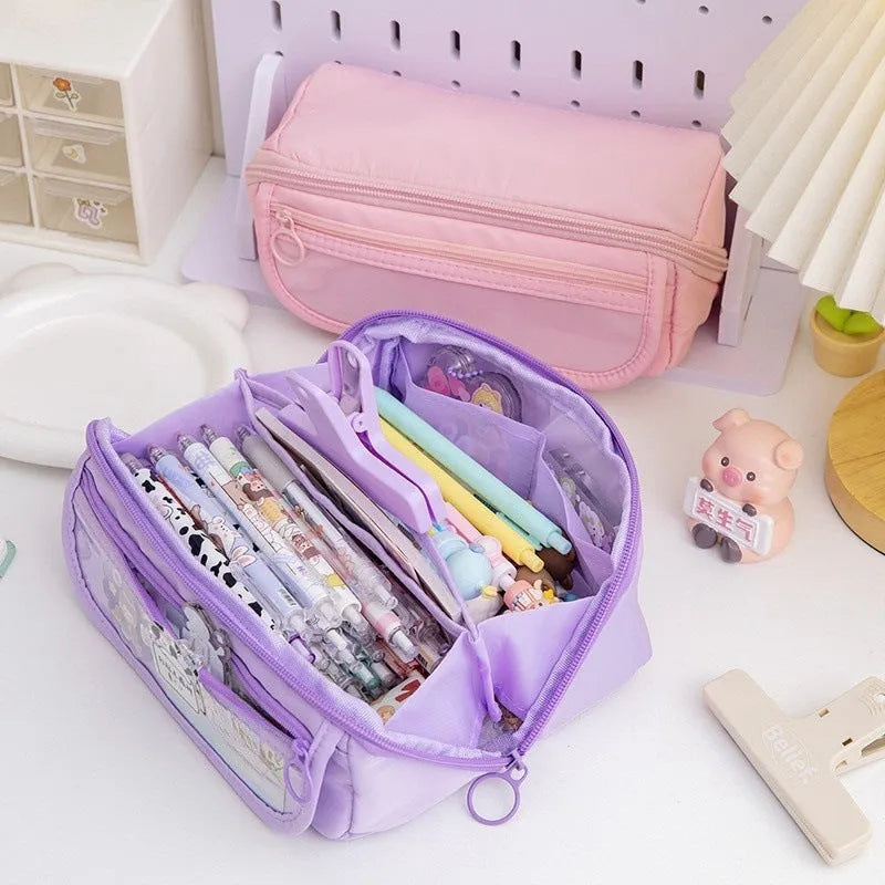 Canvas Korean-style pen case with ten-layer flip compartments open, showing internal sections.