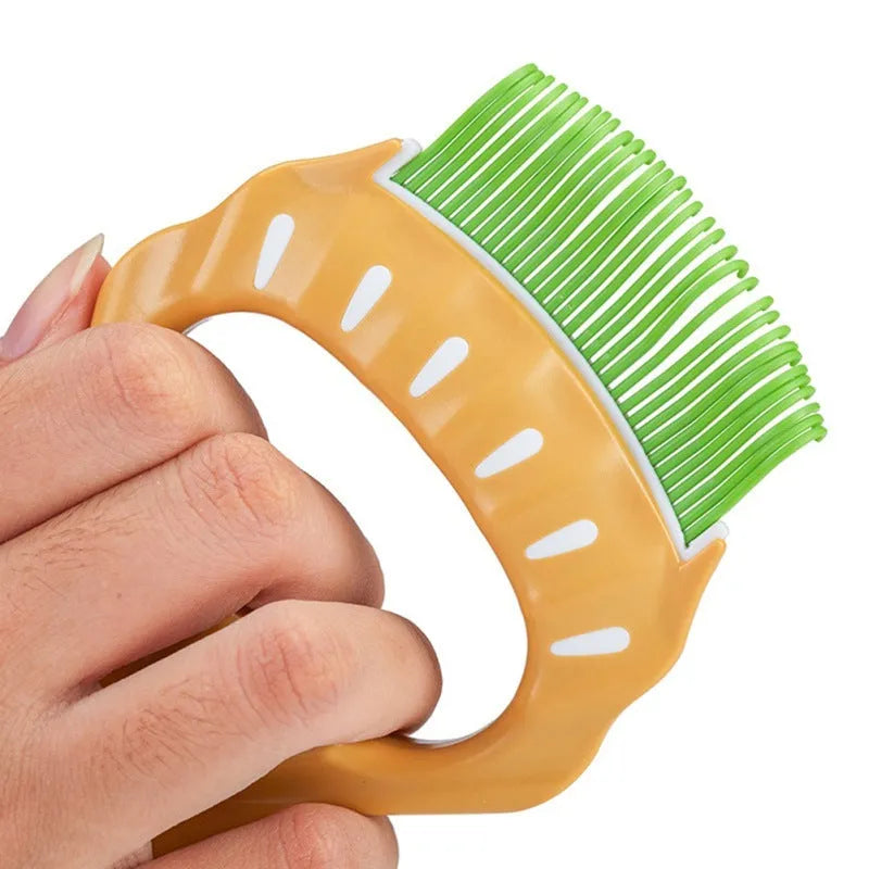 Shell-shaped pet grooming brush with coloured handle and wire bristles for dog and cat hair removal
