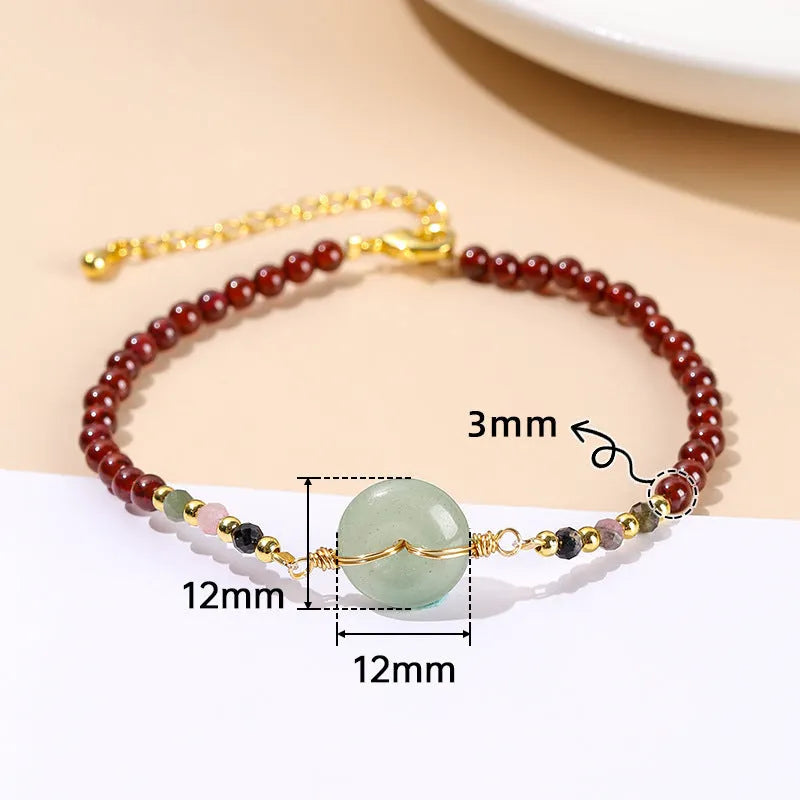 Cute round crystal agate jade bracelet for women with a garnet safety buckle.
