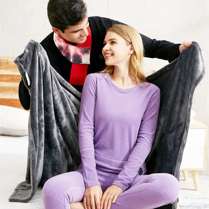Dark grey USB heated coral fleece blanket showing soft texture and USB power cable.