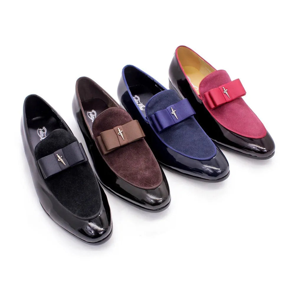 Men's glossy black patent leather low-top shoes with a tassel on a leather toe holder.