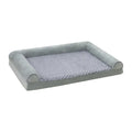 Light grey cloth dog kennel with padded base and raised sides, shown with a large dog resting inside.