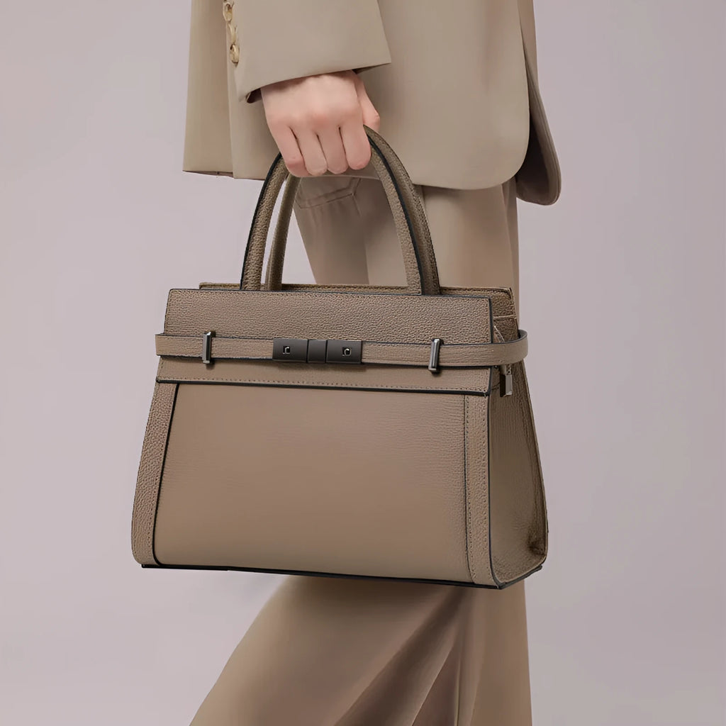 Women's horizontal square genuine leather crossbody bag with visible stitching, shown in multiple colour options.