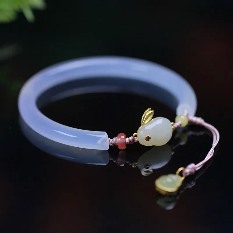 Handmade natural white agate beaded bracelet with S925 sterling silver fittings and a Ruyi charm.
