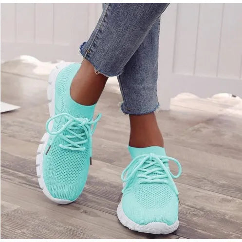 Women's breathable lace-up casual sneakers with flat heel and rubber sole in multiple colour options