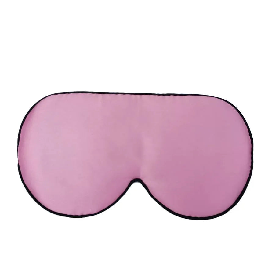 Double-sided mulberry silk sleep mask with embroidered print in various colours.