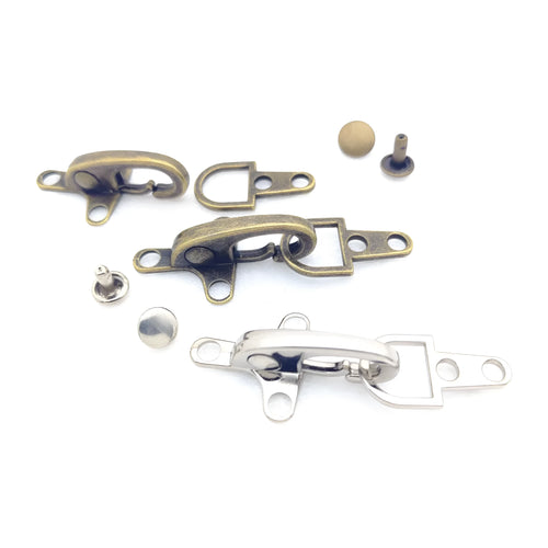 Alloy metal aircraft buckle decoration measuring 5.85cm in bronze, gold, gun colour or silver finish