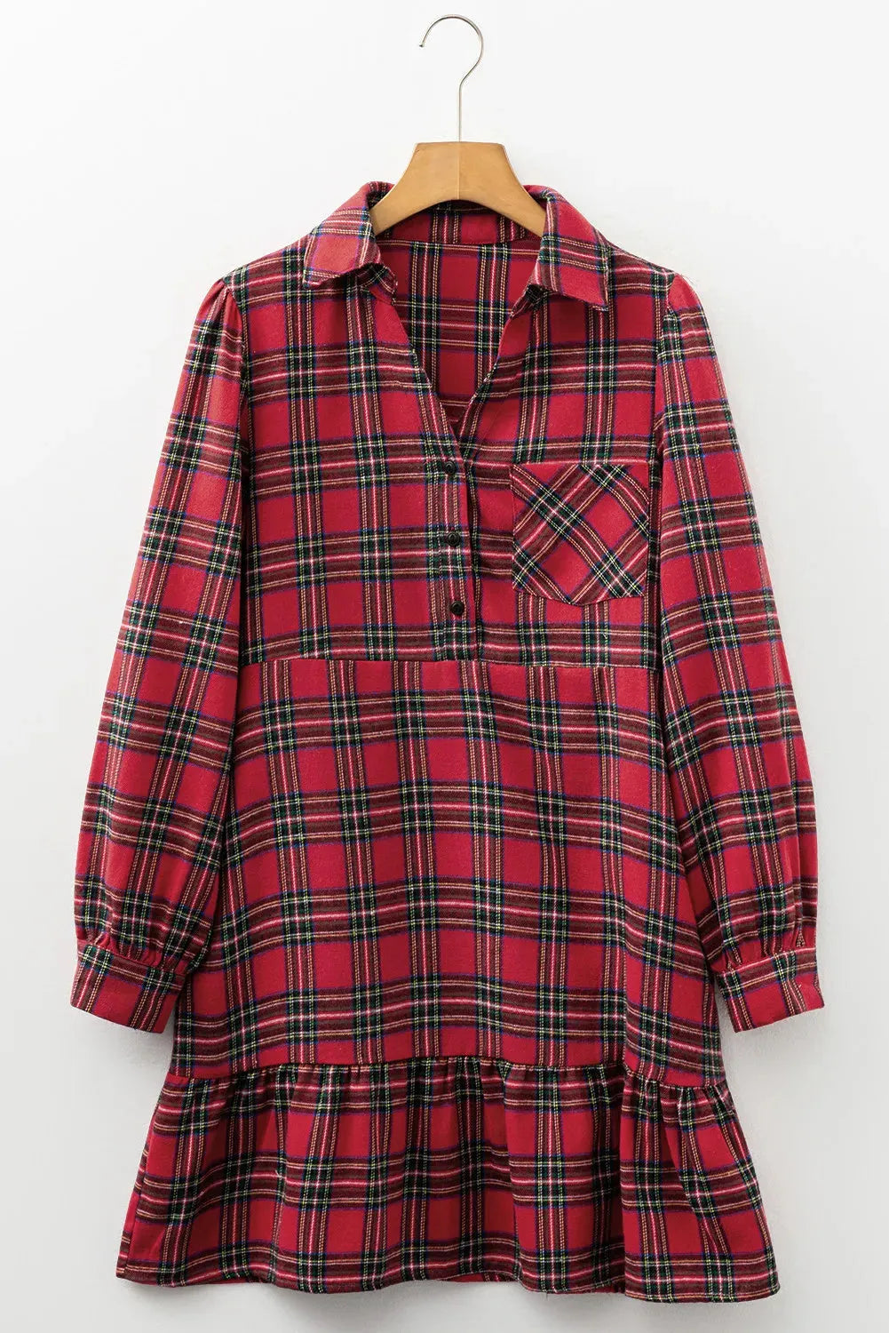 Red and black plaid mini dress with a shirt collar, long sleeves, half-button front, and a ruffled hem.
