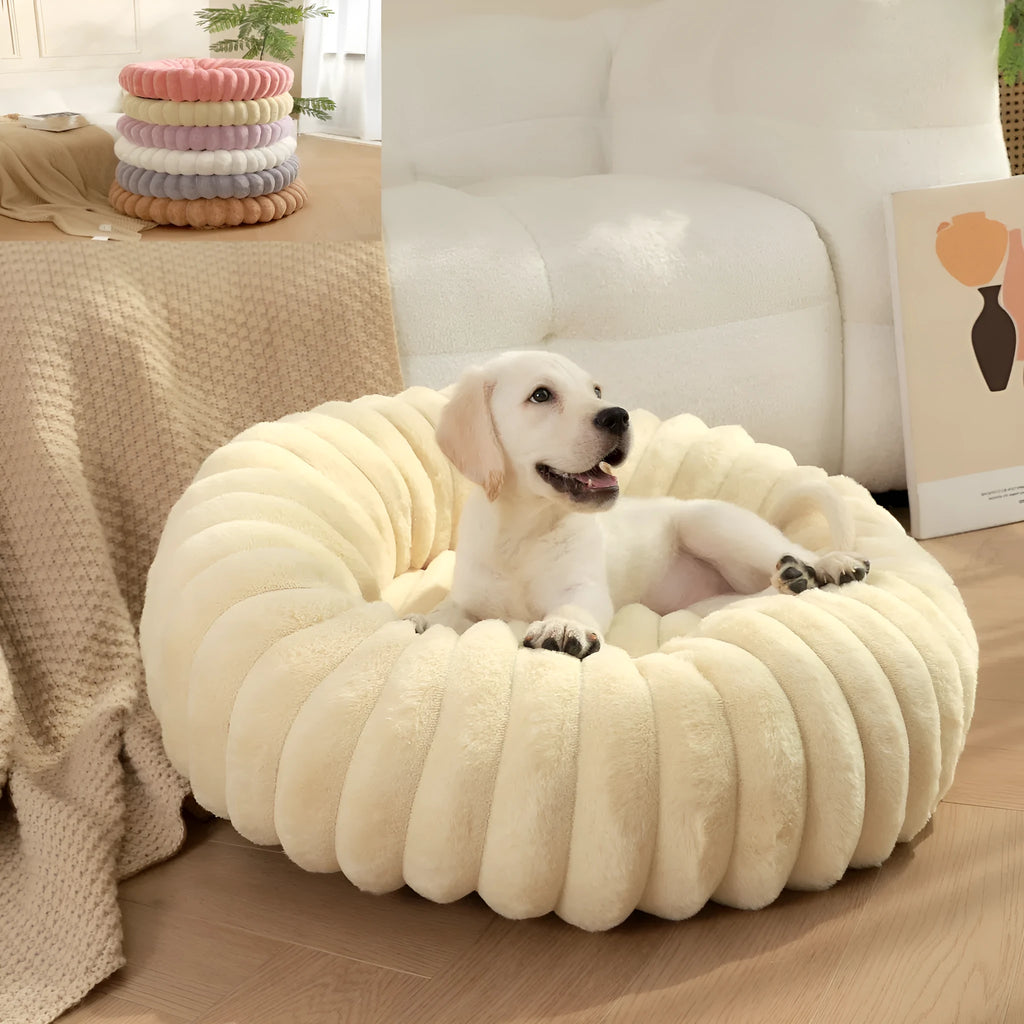 Round plush pet mat in beige, showing long-hair texture and circular shape
