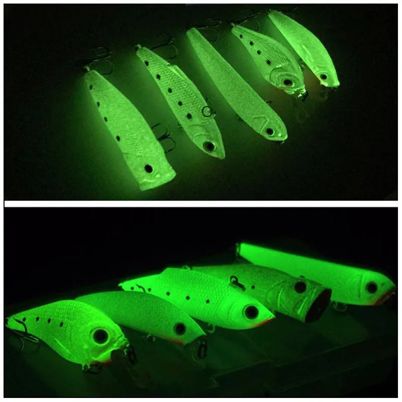 Set of five 3D fluorescent hard bait fishing lures on a blue background.