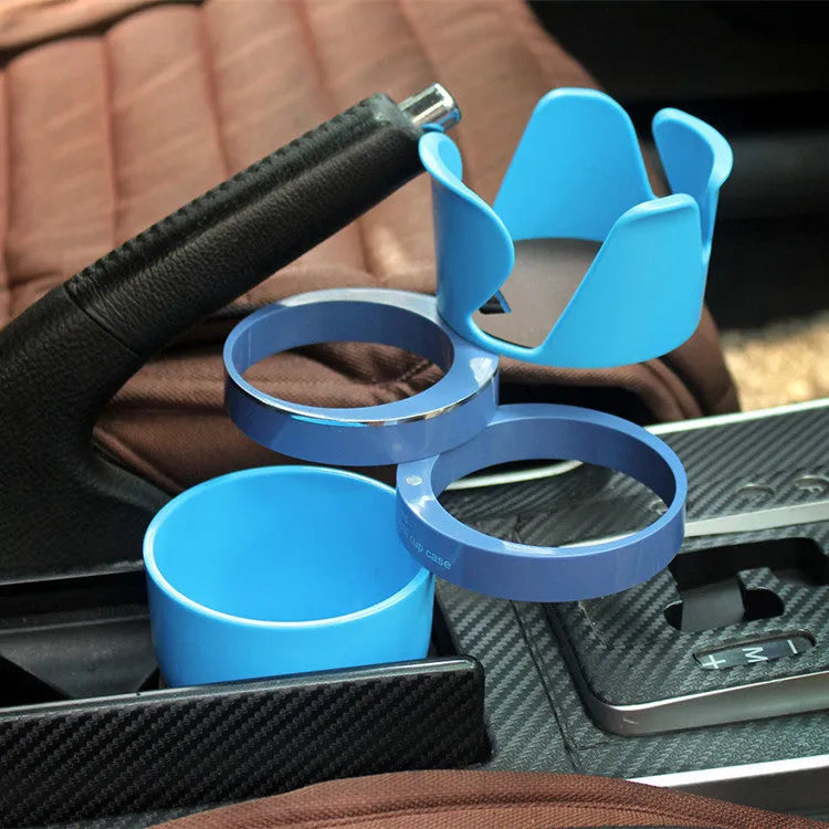 Black multifunction car cup holder with attached navigation phone mount bracket.