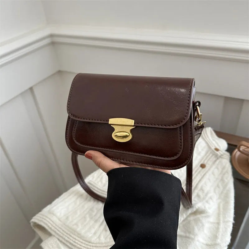 Retro square crossbody bag in PU leather with horizontal suitcase shape, 25 cm width