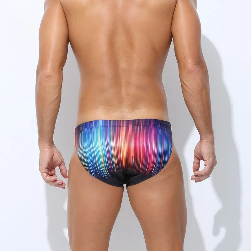 Men's printed swimming trunks in polyester fabric showing cyber, ice cream, streamer and skull pattern options