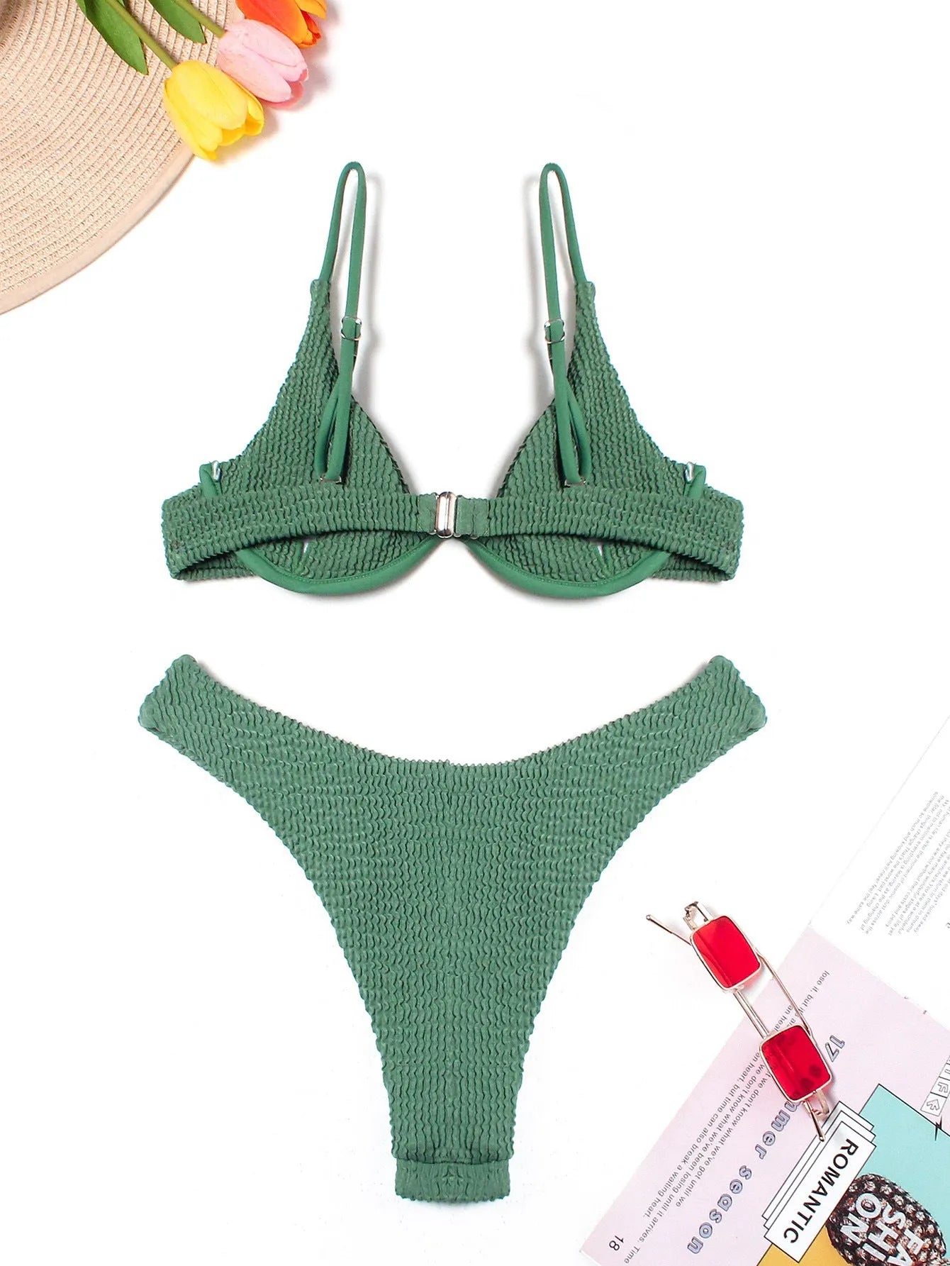 Women's green bikini swimsuit with ruffle trim top and split skirt bottom