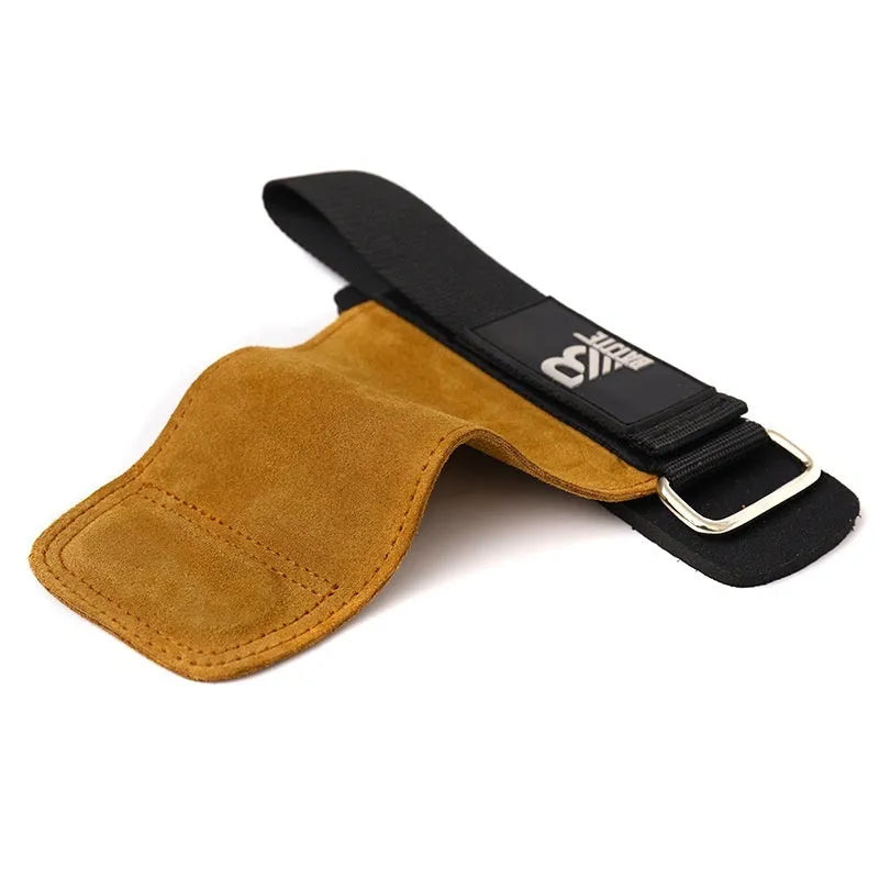 Pair of brown fitness wrist protectors showing silicone grip dots on the palm side.