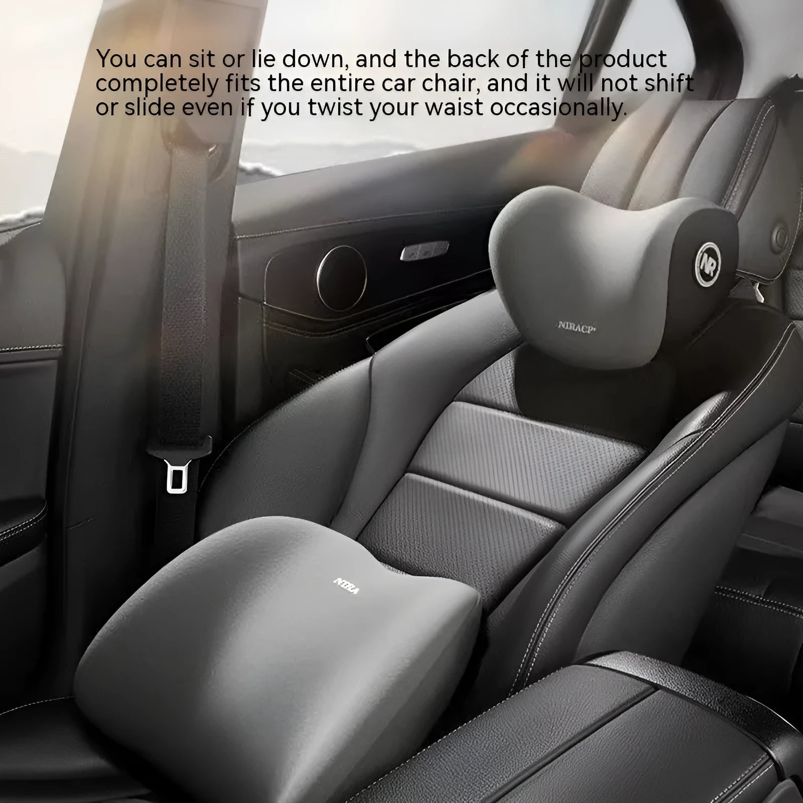 Black memory foam car headrest pillow and matching lumbar support pillow on a car seat.