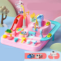 Big Adventure plastic toy set with multi-level parking garage, car tracks, and toy vehicles laid out for play.
