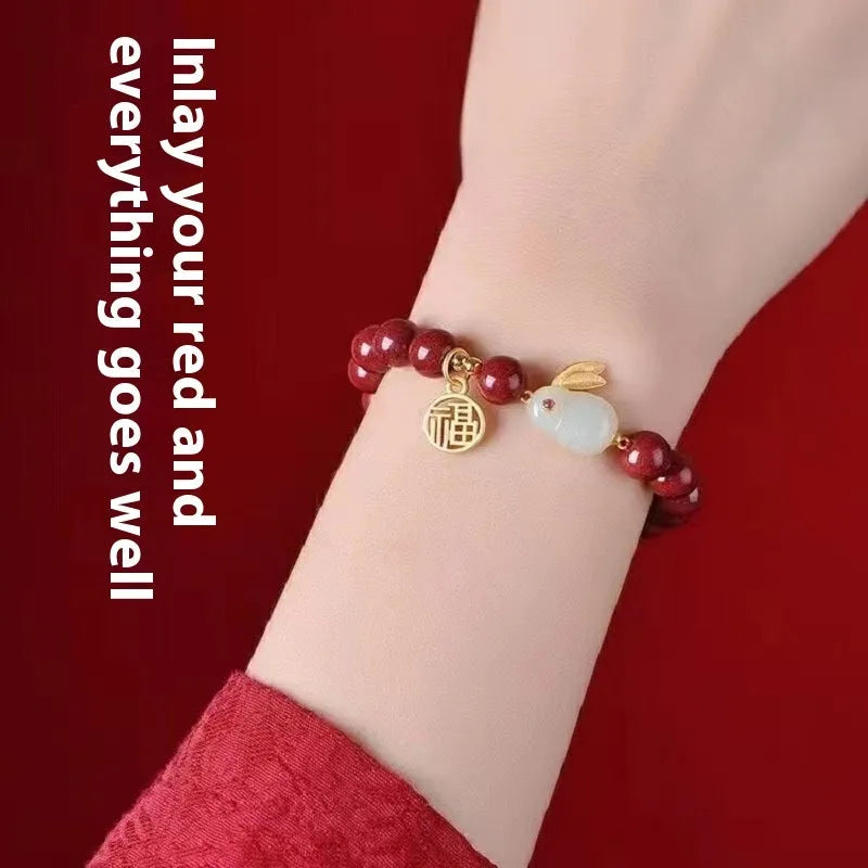 Cinnabar bracelet with jade hare charm and purple gold sand beads in retro style