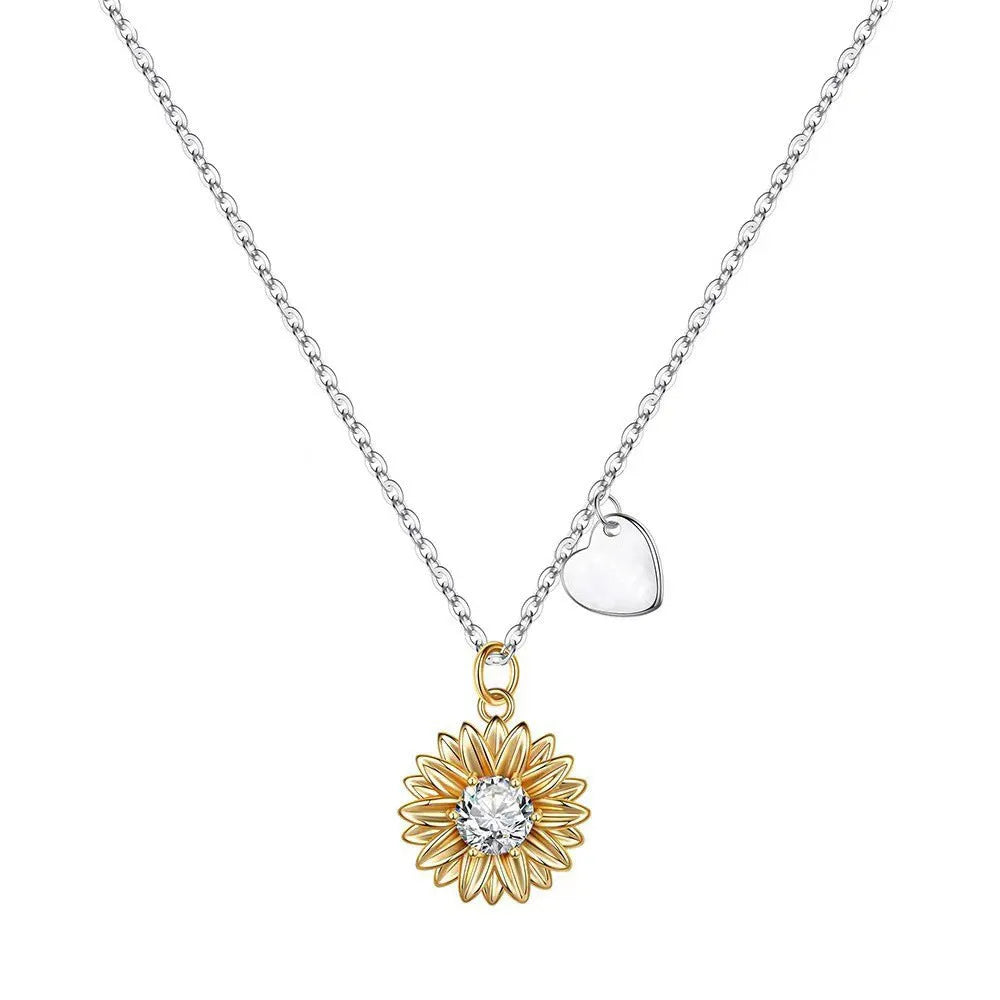 Adjustable 925 silver sunflower necklace with daisy-petal pendant on a cross chain.