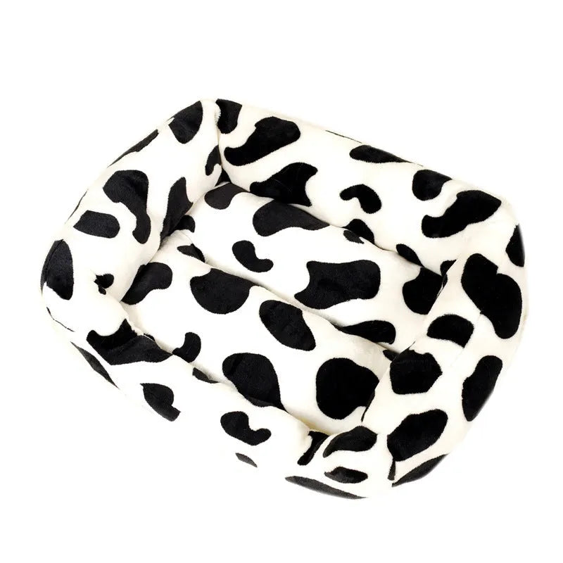 Four Seasons universal kennel dog bed in cow colour cloth, available in sizes S to XL from 30 to 85 cm