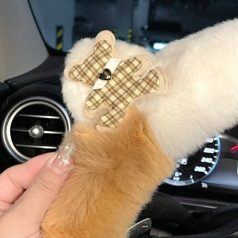 Milk tea white plush steering wheel cover with cute panda ears design on a car steering wheel