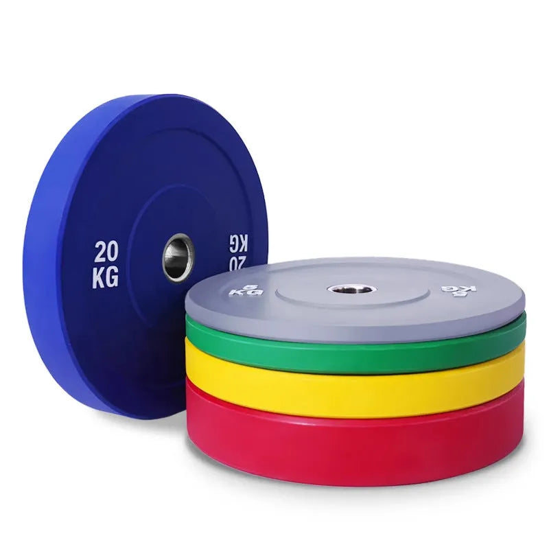 Macaron elastic rubber weight plate in blue 20kg with large centre hole on a gym floor