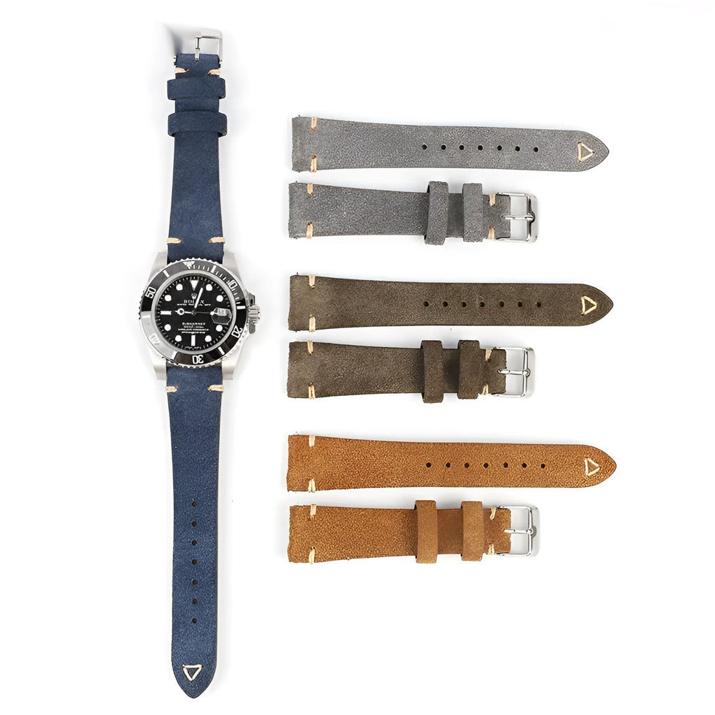 Brown suede leather watch strap with small waist design shown next to blue, grey, and army green colour options.
