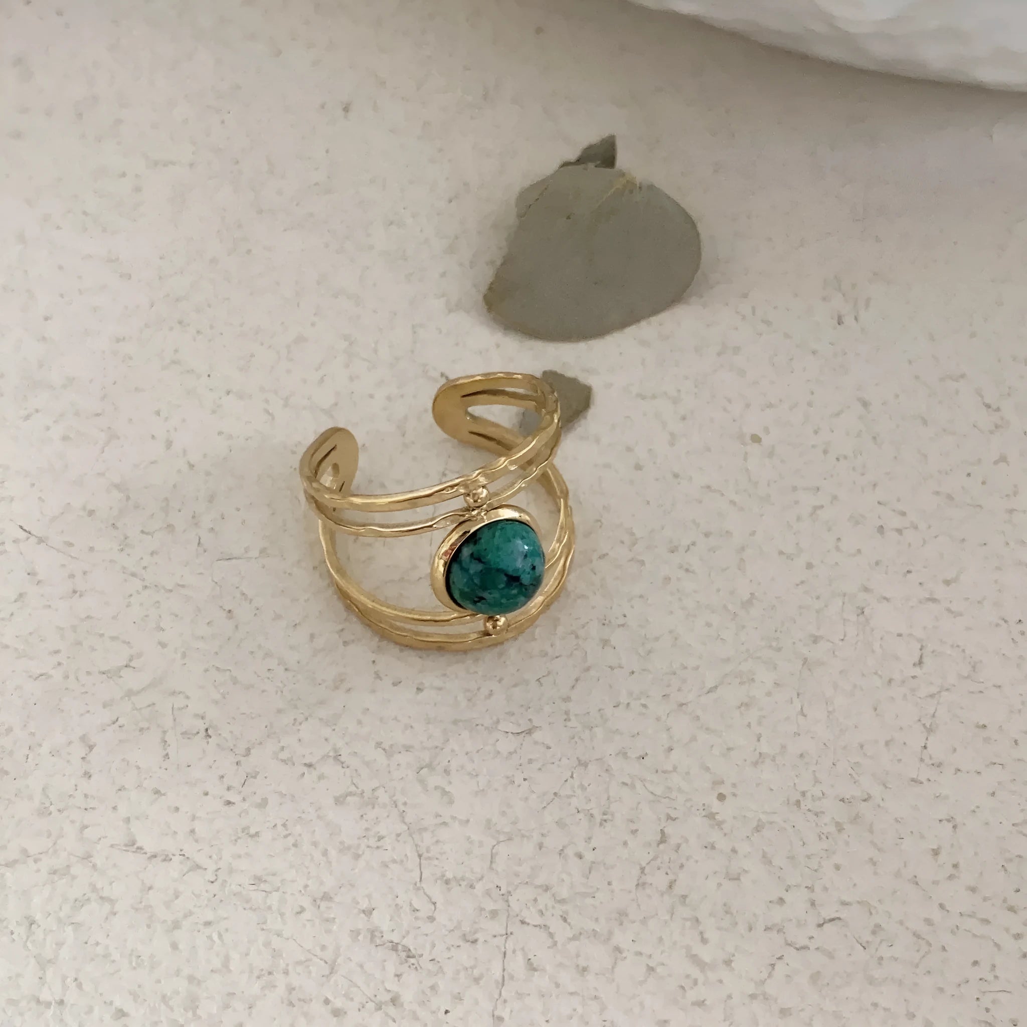 Geometric open ring with titanium steel electroplating and natural green stone elements