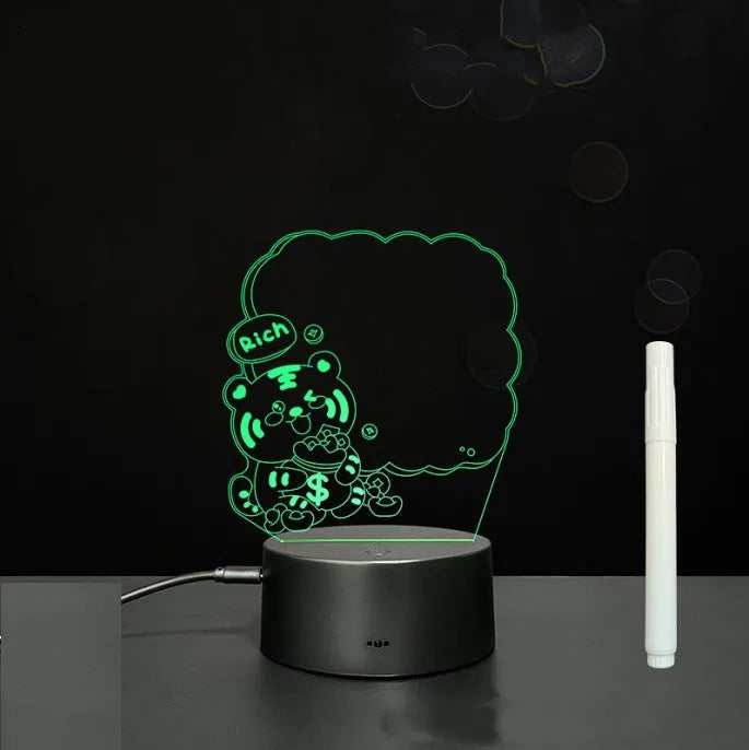 3D acrylic LED message board with touch control, black ABS base, USB cable, and stylus pen on desk