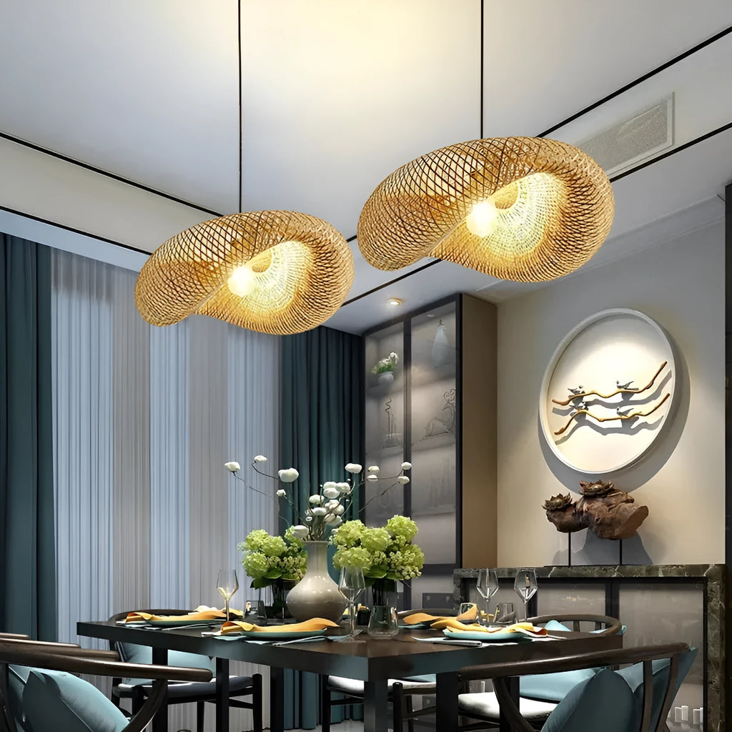 Bamboo hanging lamp with straw hat-shaped rattan weave in natural tones showing light diffusion