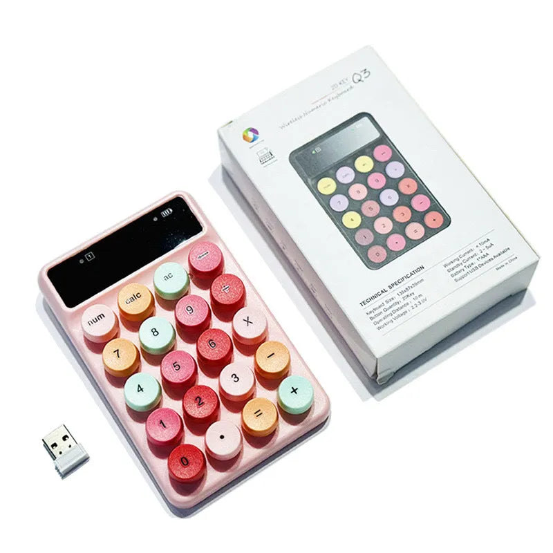 Q3 wireless mini keyboard in Macaron colours on desk