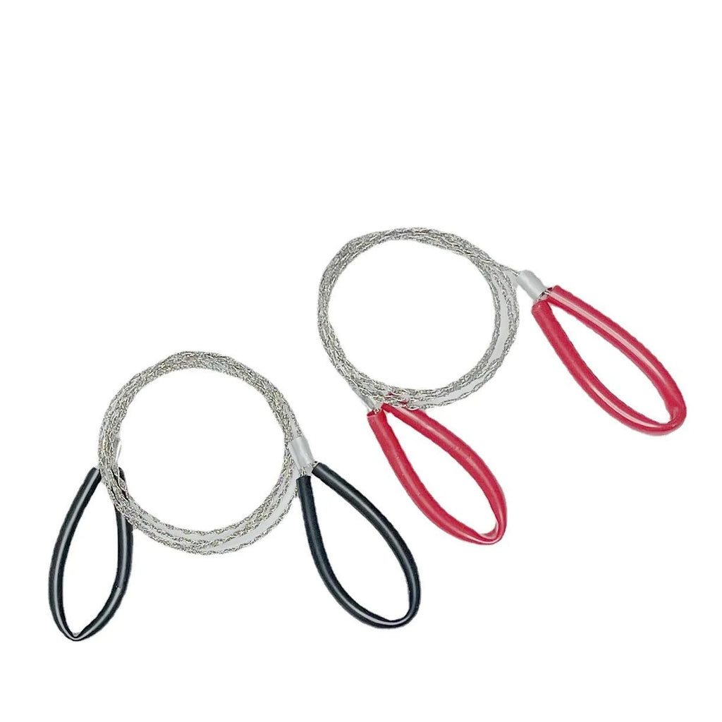 Close-up of a black and red stainless steel survival wire saw coiled in its storage bag.