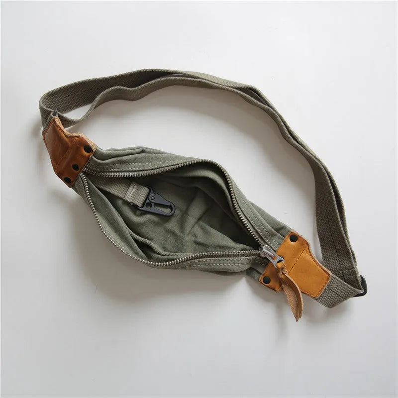 Green retro military style chest bag made from canvas with Italian leather trim